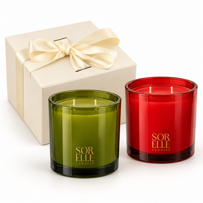 Luxury candle gift set: green Balsam Forest and red Merry & Bright candles with an ivory gift box