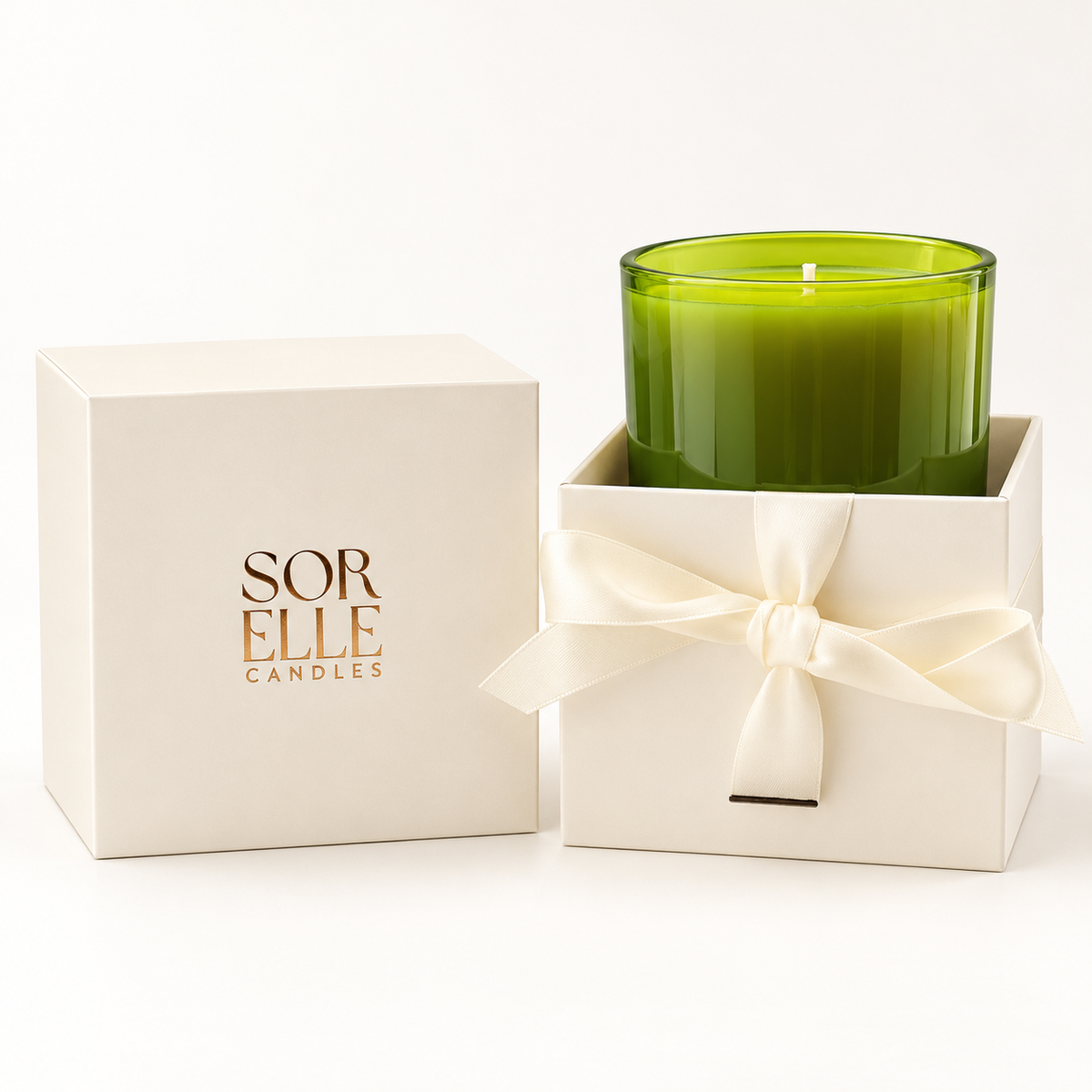 Balsam Forest green glass candle set in an open ivory gift box with cream ribbon