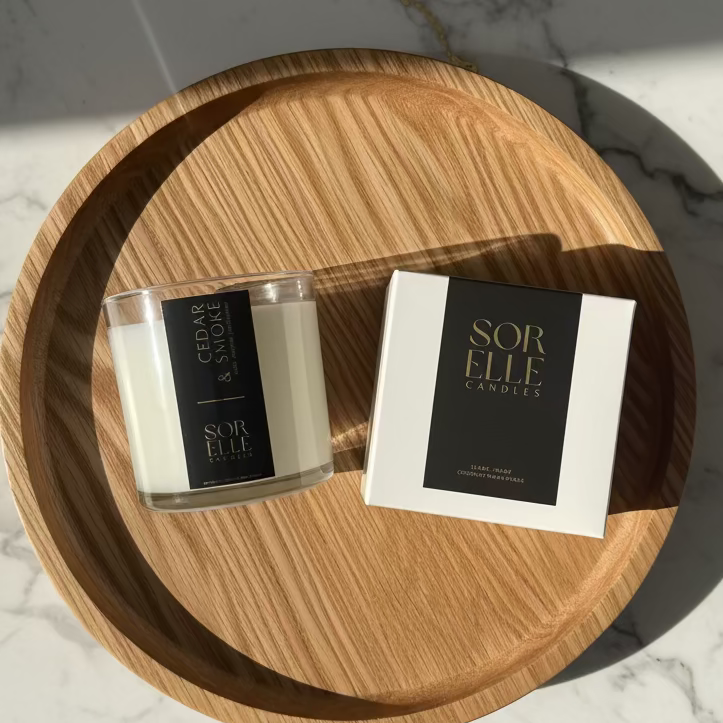 Hand-poured Cedar & Smoke coconut soy wax candle with cedar, charcoal, and frankincense notes — masculine fall fragrance in glass jar