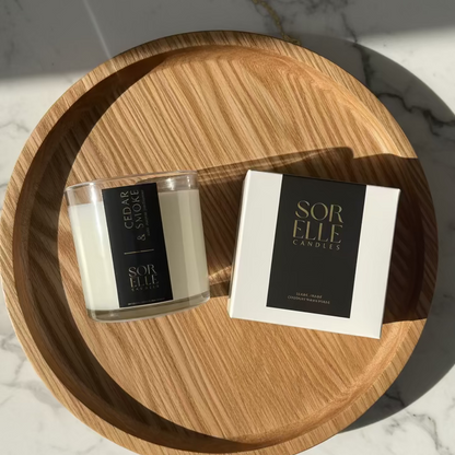 Hand-poured Cedar & Smoke coconut soy wax candle with cedar, charcoal, and frankincense notes — masculine fall fragrance in glass jar