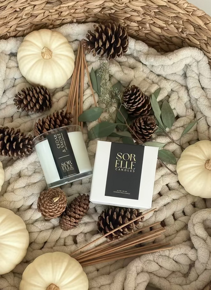 Hand-poured Cedar & Smoke coconut soy wax candle with cedar, charcoal, and frankincense notes — masculine fall fragrance in glass jar