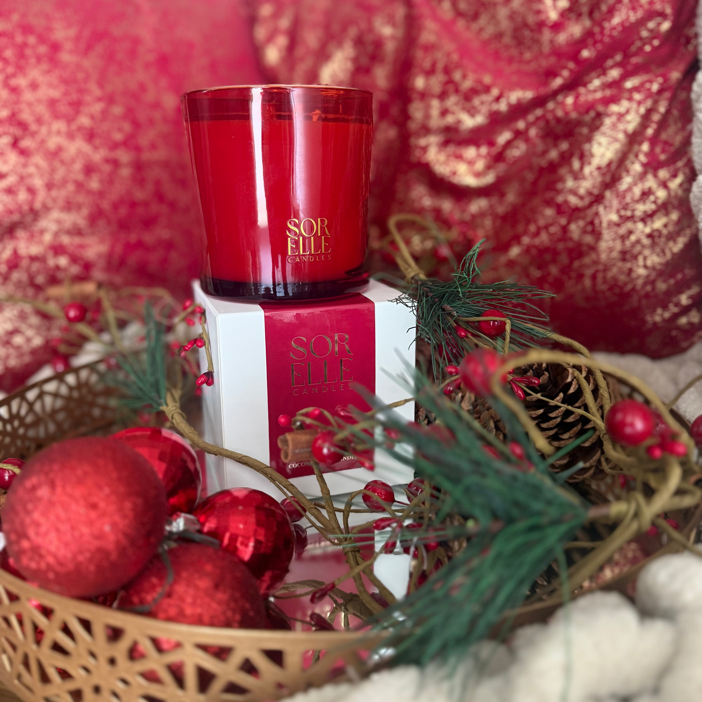 red glass coconut wax, champagne scented coconut soy wax candle. Gold sorelle logo